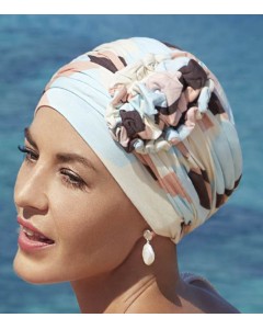 Turban avec motifs géométriques bleus et roses